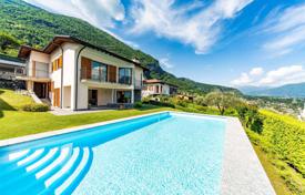 Комфортабельная вилла с частным садом, бассейном, парковкой, террасой и видом на озеро, Тремеццо, Италия за 3 100 000 €