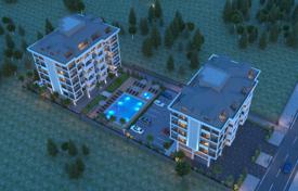 Просторные апартаменты со студией в новой качественной резиденции с бассейнами и садом, в 200 метрах от пляжа, Аланья, Турция за $495 000