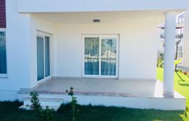 Комфортабельная квартира 2+1 с террасой и выходом в сад на берегу Средиземного моря в районе Бодрум за 237 000 €