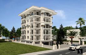 Новые квартиры с живописным видом в резиденции с бассейном и садом, в 100 метрах от моря, Аланья, Турция за $138 000