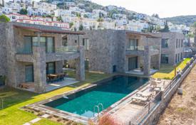 Новая вилла с садом в резиденции с бассейном, в 300 метрах от пляжа, Битез, Турция за $6 800 в неделю