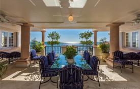 Стильные солнечные апартаменты на первой линии от океана в Фишер Айленд, Флорида, США за 9 304 000 €