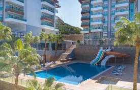 Квартира с двумя балконами, общим бассейном и видом на море, Каргыджак, Турция за $154 000