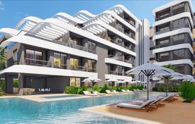 Новая резиденция с бассейном, спа-центром и собственным пляжем рядом с аэропортом, Алания, Турция за От $136 000