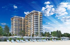 Новый жилой комплекс класса люкс на первой линии моря в курортном городе Махмутлар, Турция за От $231 000